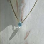 Collier topaze bleue doré