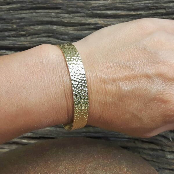 Golden hammered bangle bracelet