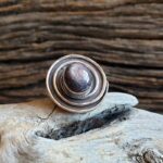 Bague rubis étoilé mauve-noir