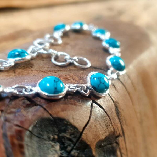 Zilveren en turquoise armband