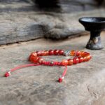 Bracelet porte bonheur rouge ANCRAGE